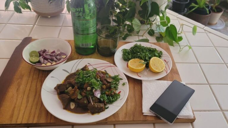 Nkwobi-inspired beef and sweetbread ketovore plate with arugula, lemon, and key lime
